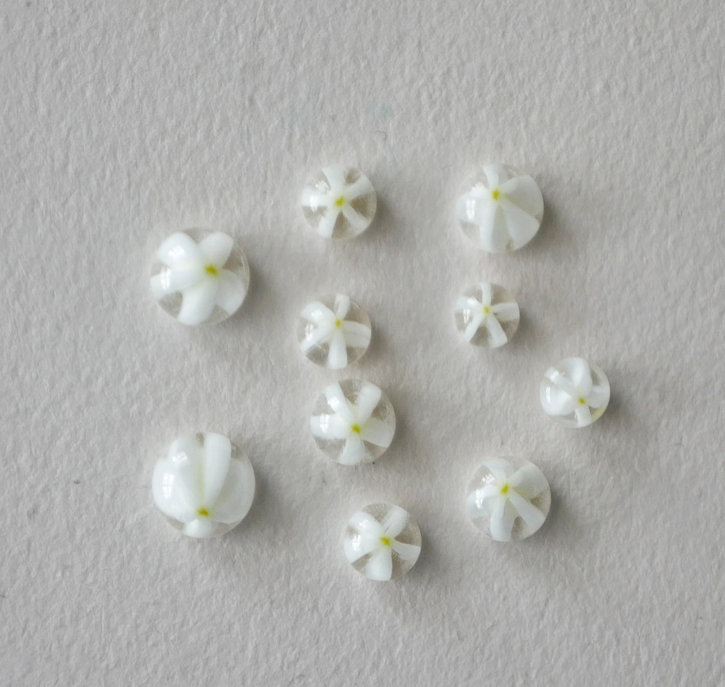 10 White Floral Tokens