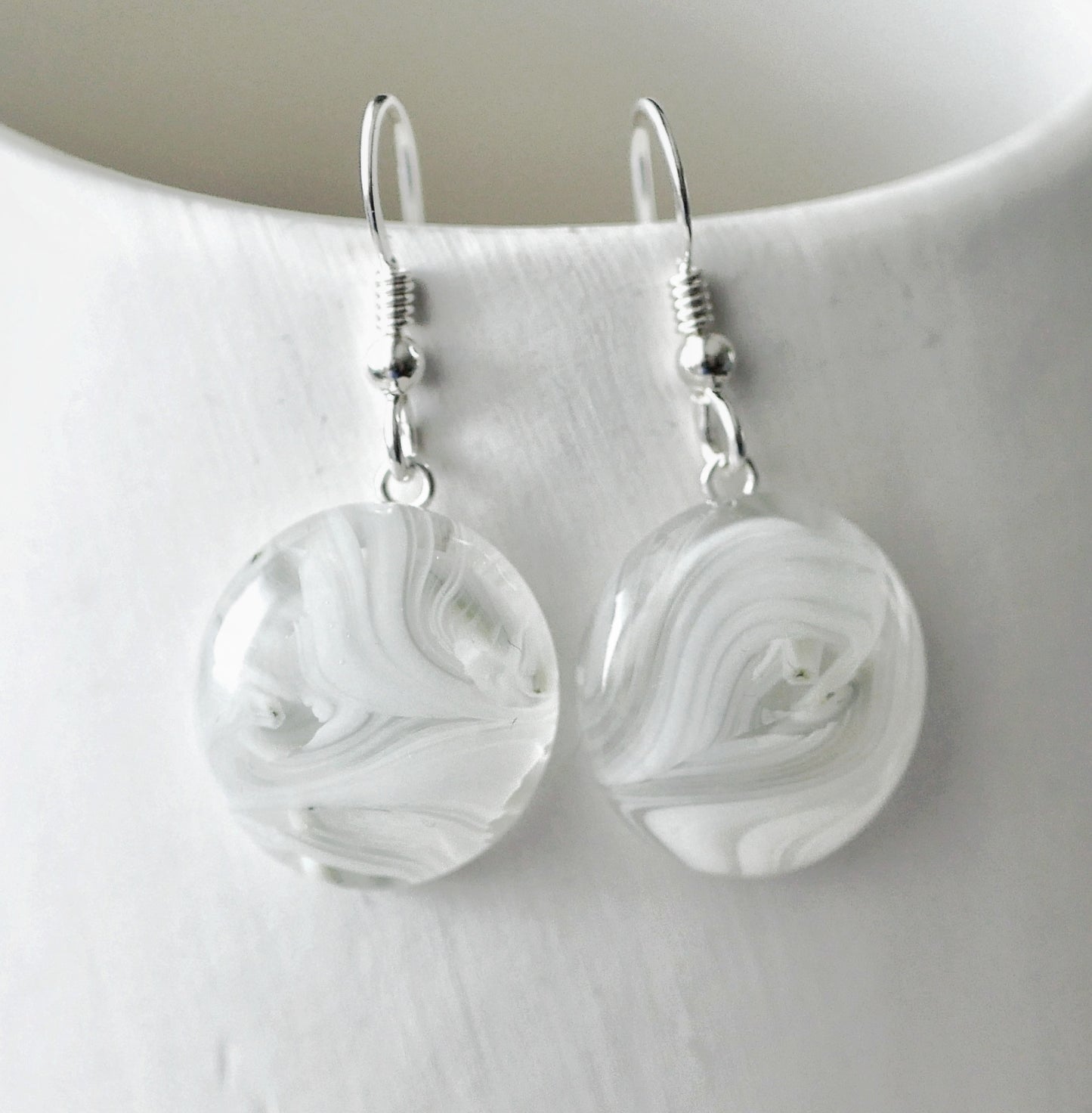 Dangly Swirling White Earrings